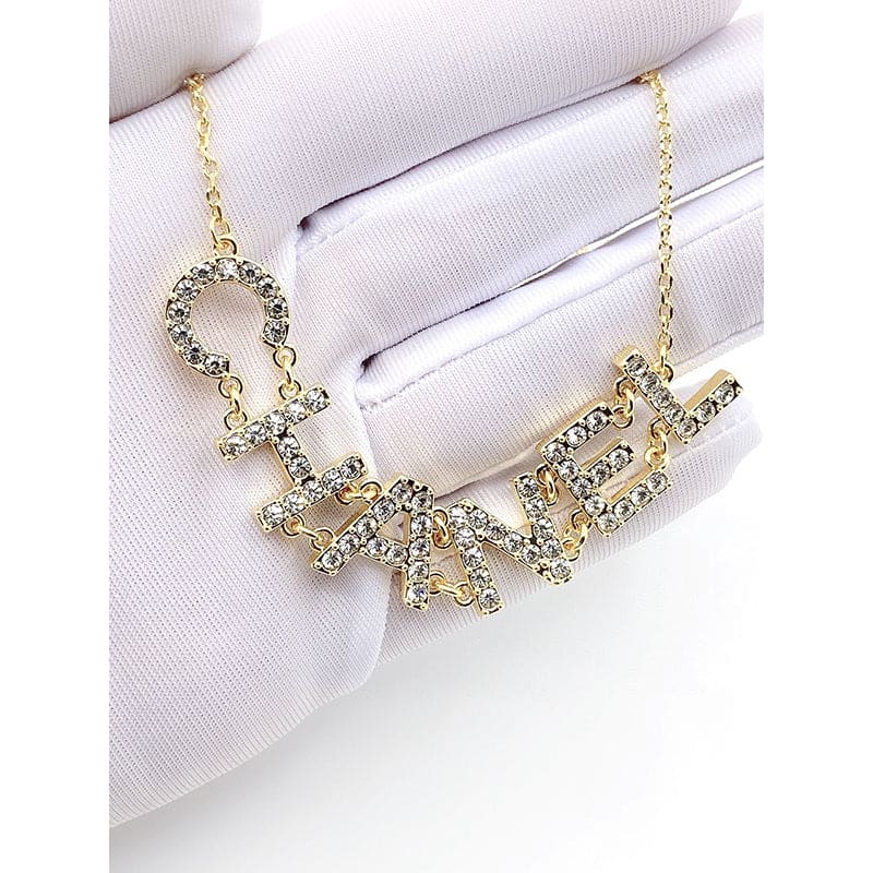 Chanel Crystal 90's Icon Logo 18K Gold Necklace