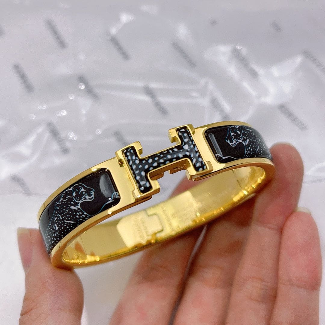 Hermes Guepards Clic Clac 18K Gold Bracelet