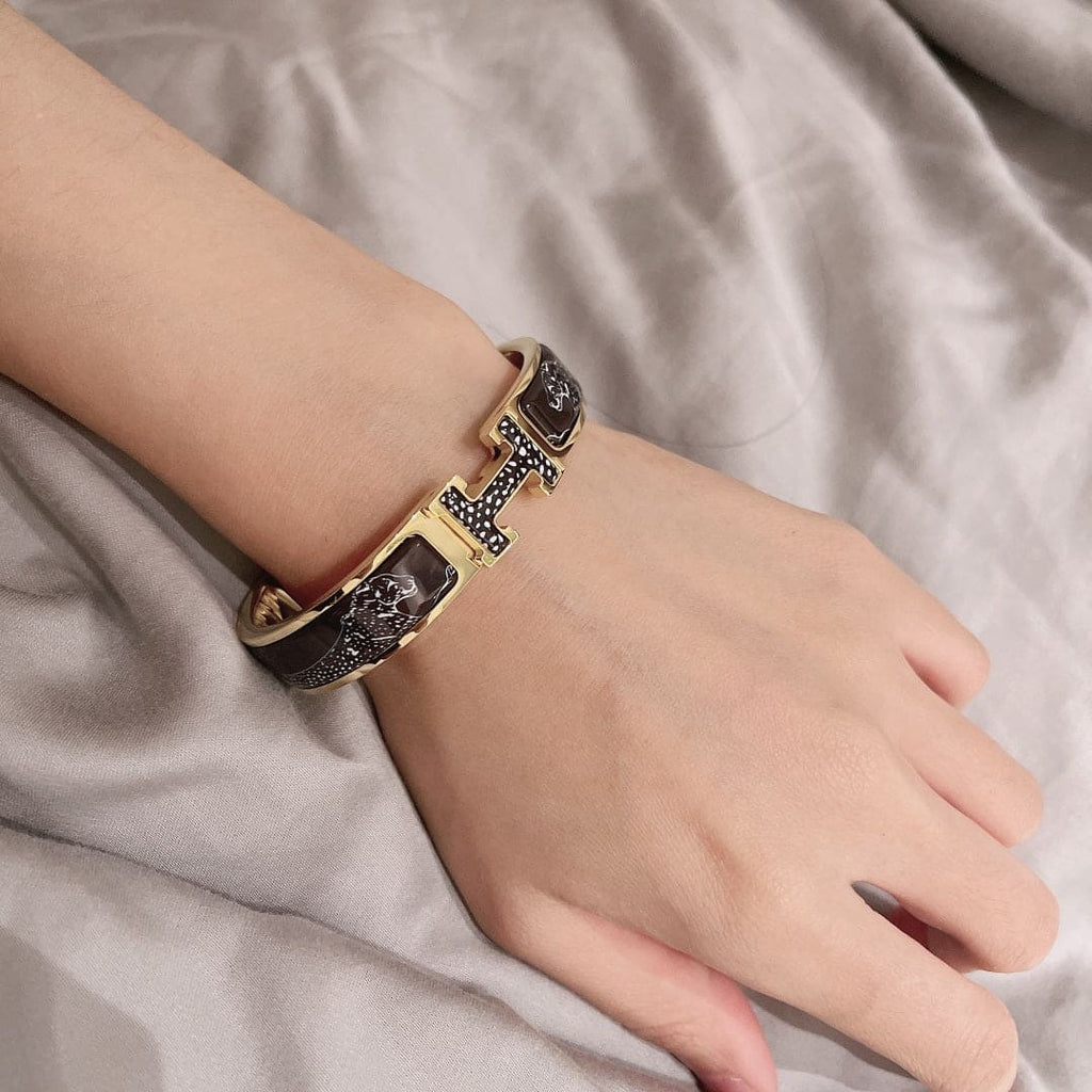 Hermes Guepards Clic Clac 18K Gold Bracelet