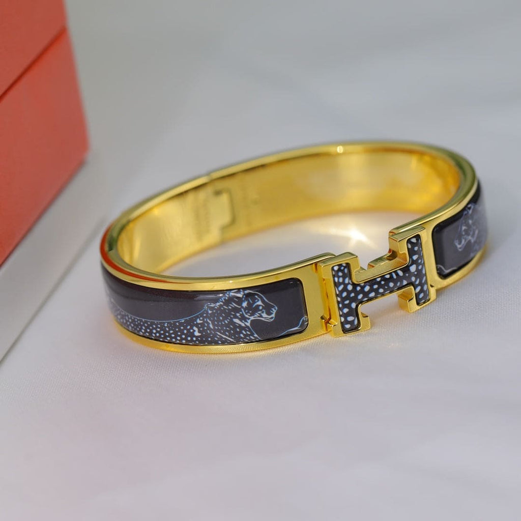Hermes Guepards Clic Clac 18K Gold Bracelet