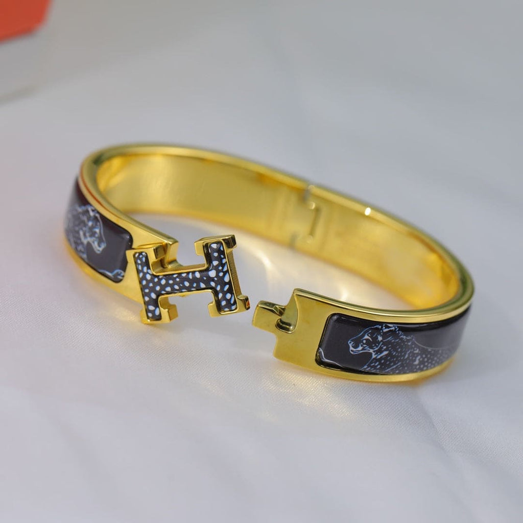 Hermes Guepards Clic Clac 18K Gold Bracelet