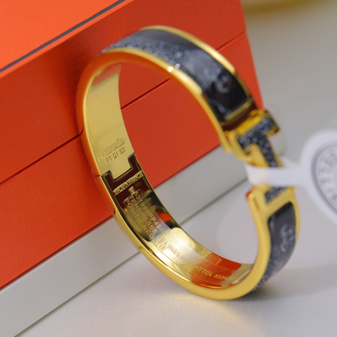 Hermes Guepards Clic Clac 18K Gold Bracelet