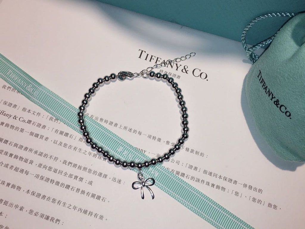 Tiffany Bow Charm Bead 18K Gold Bracelet