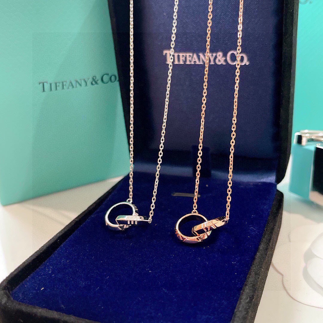 Tiffany Atlas X Closed Interlocking Pendant 18K Gold Necklace