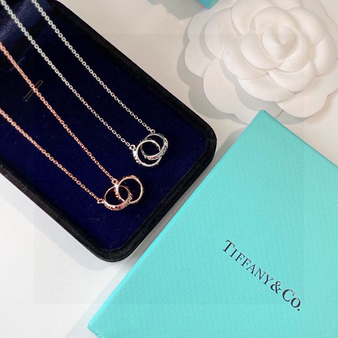 Tiffany Atlas X Closed Interlocking Pendant 18K Gold Necklace