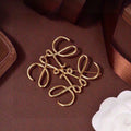 LOEWE Anagram Gold 18K Gold Brooch