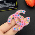 Chanel Pink & Black Star 18K Gold Brooch