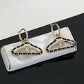 Chanel Coat Hanger 18K Gold Earrings
