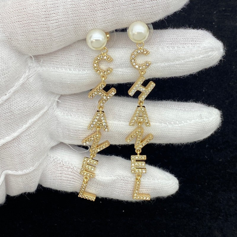 Chanel Script Long Tassel 18K Gold Earrings