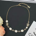 Chanel Black & White Camellia 18K Gold Necklace