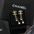 Chanel Long Pearl Pendant 18K Gold Earrings