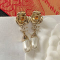 Chanel Camellia Pearl 18K Gold Earrings