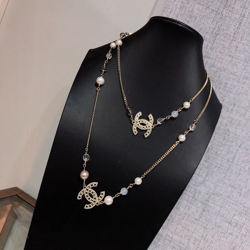 Chanel Long Pearl 18K Gold Necklace