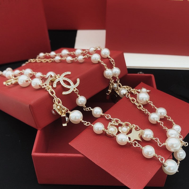 Chanel No.5 Star Long Pearl 18K Gold Necklace