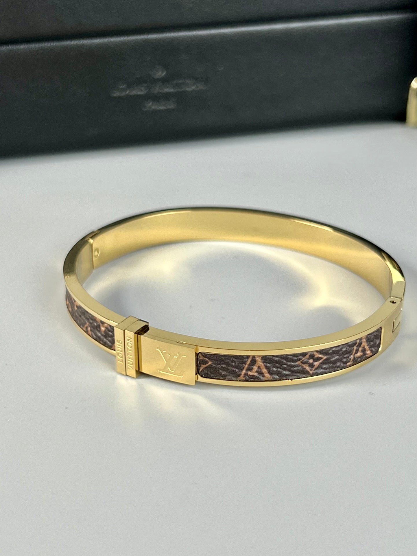 Louis Vuitton Leather 18K Gold Bracelet