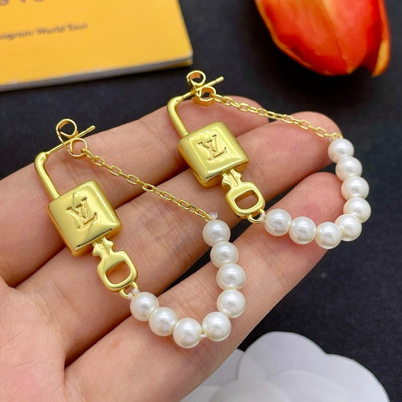 Louis Vuitton Pearl Lock Gold 18K Gold Earrings