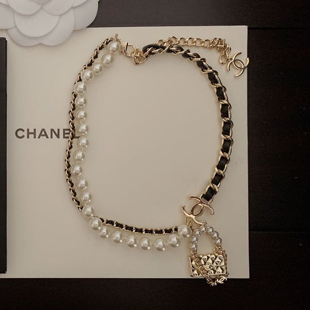 Chanel Pearl Leather Bag Pendant 18K Gold Necklace