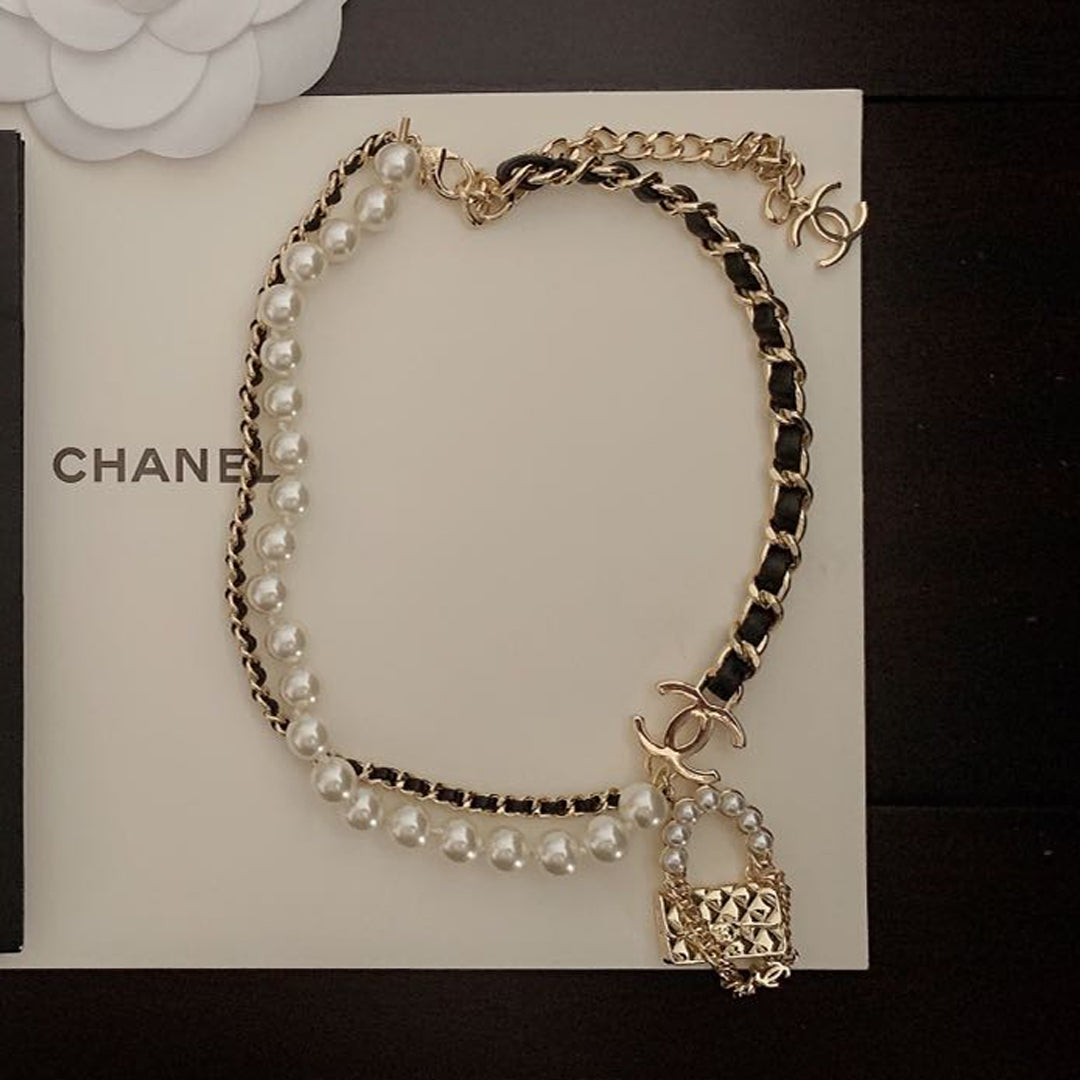 Chanel Pearl Leather Bag Pendant 18K Gold Necklace