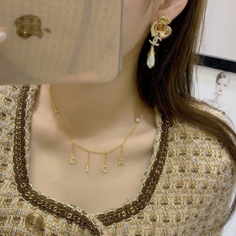 Chanel Camellia Pearl 18K Gold Earrings