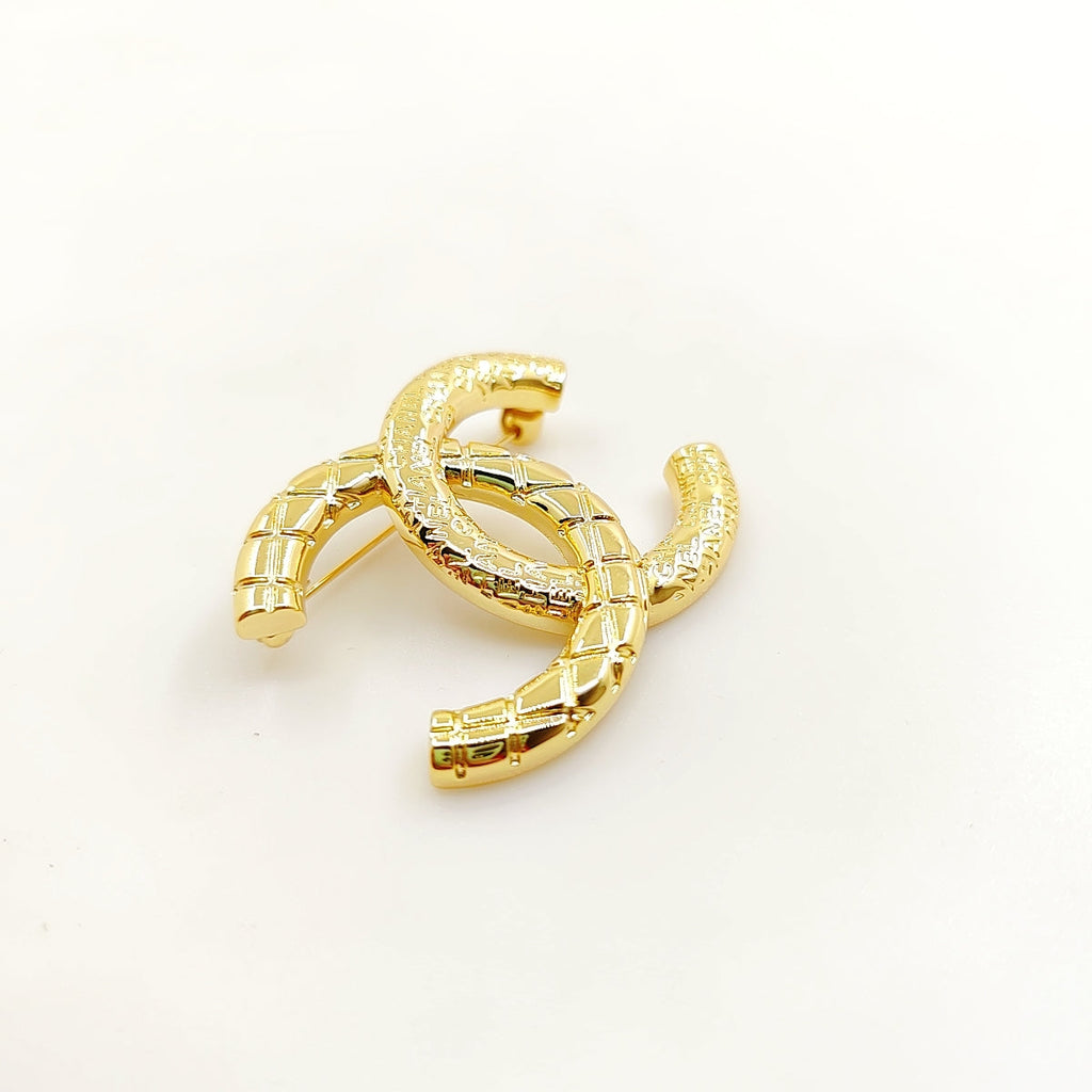Chanel 24S 18K Gold Brooch