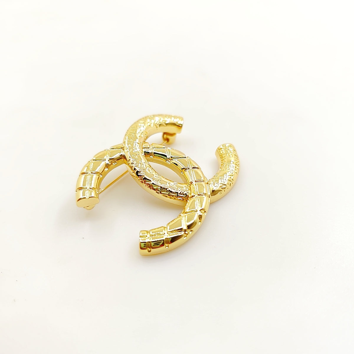 Chanel 24S 18K Gold Brooch