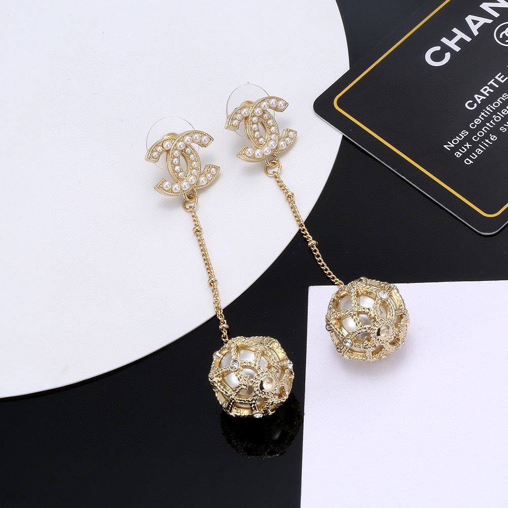 Chanel Pearl Long 18K Gold Earrings