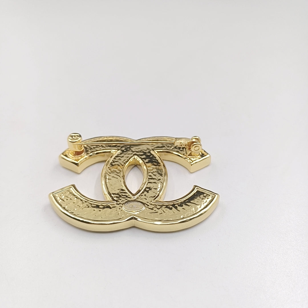 Chanel Black 18K Gold Brooch