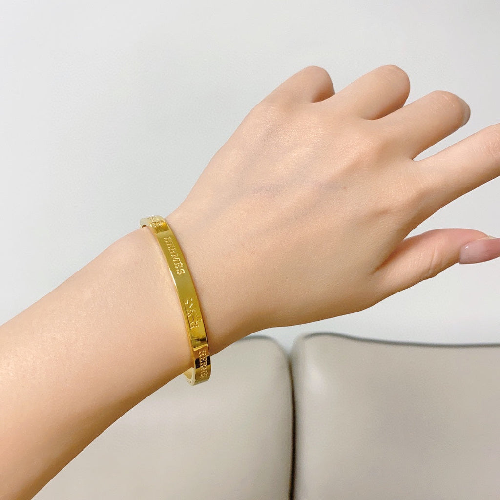 Hermes 18K Gold Bracelet