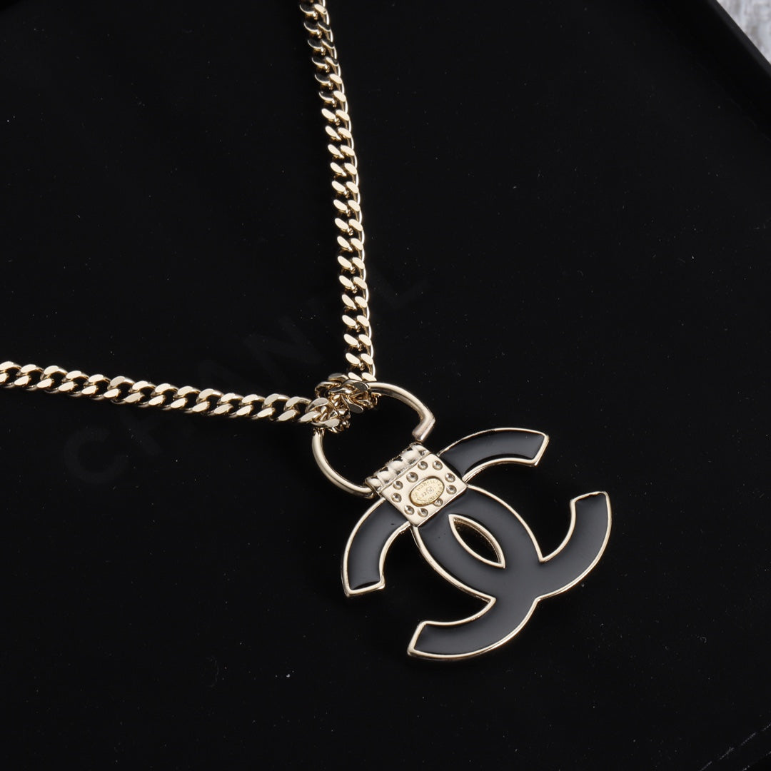 Chanel Black Resin Logo 18K Gold Necklace
