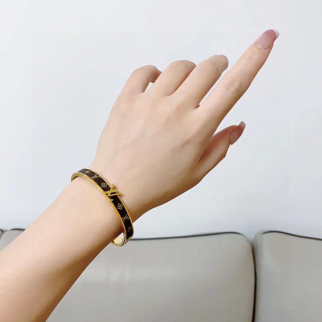 Louis Vuitton Leather Vintage 18K Gold Bracelet