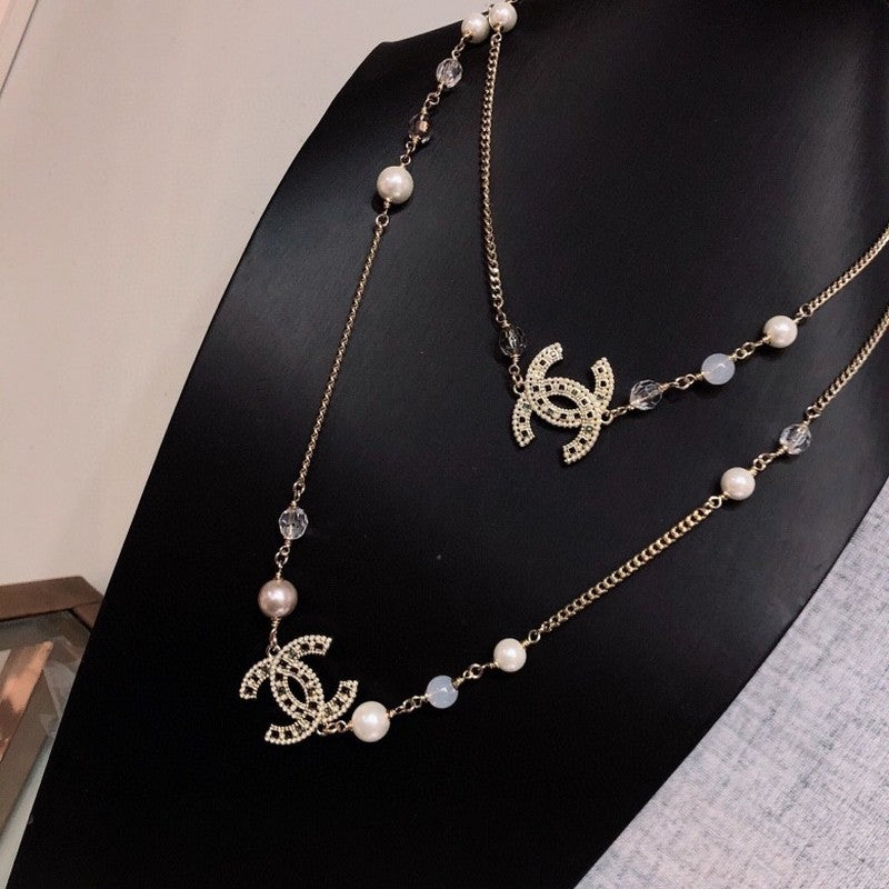 Chanel Long Pearl 18K Gold Necklace