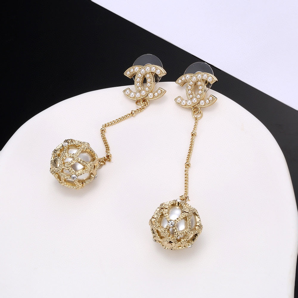 Chanel Pearl Long 18K Gold Earrings
