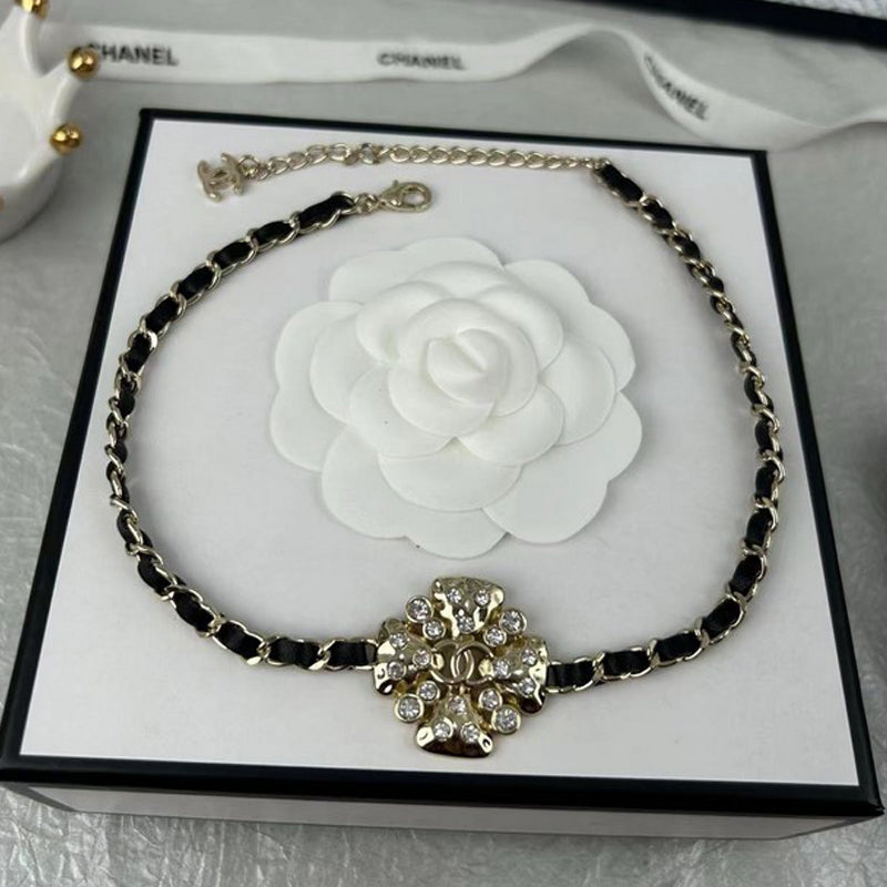 Chanel Black Leather Flower 18K Gold Necklace