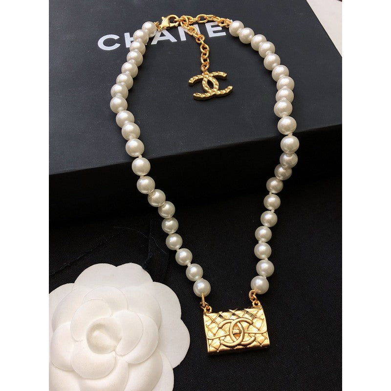 Chanel Pearl Bag Pendant 18K Gold Necklace