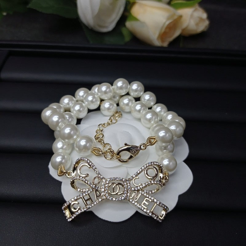 Chanel Bow Pearl 18K Gold Necklace