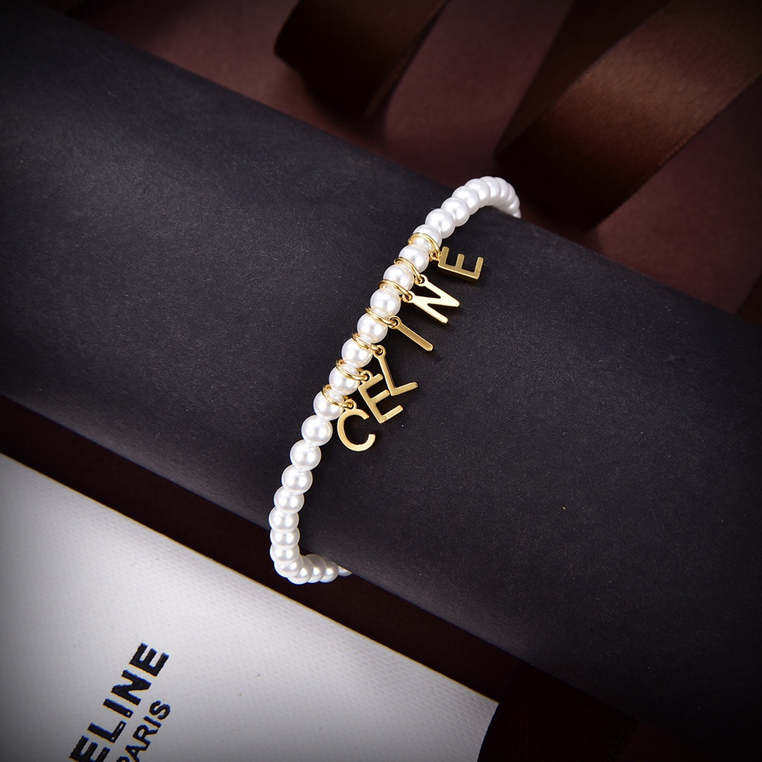 Celine Paris Pearls 18K Gold Bracelet