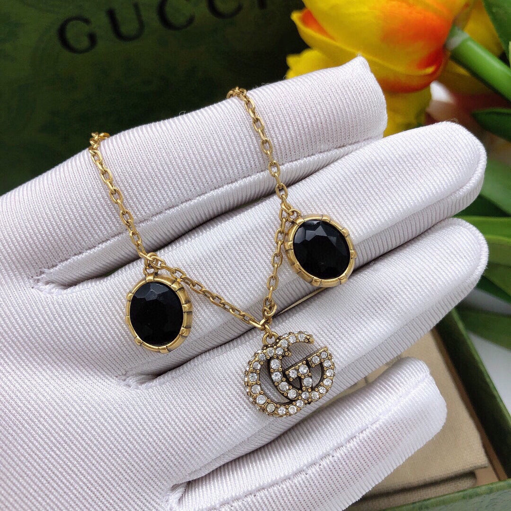 Gucci Double Black Stones 18K Gold Bracelet