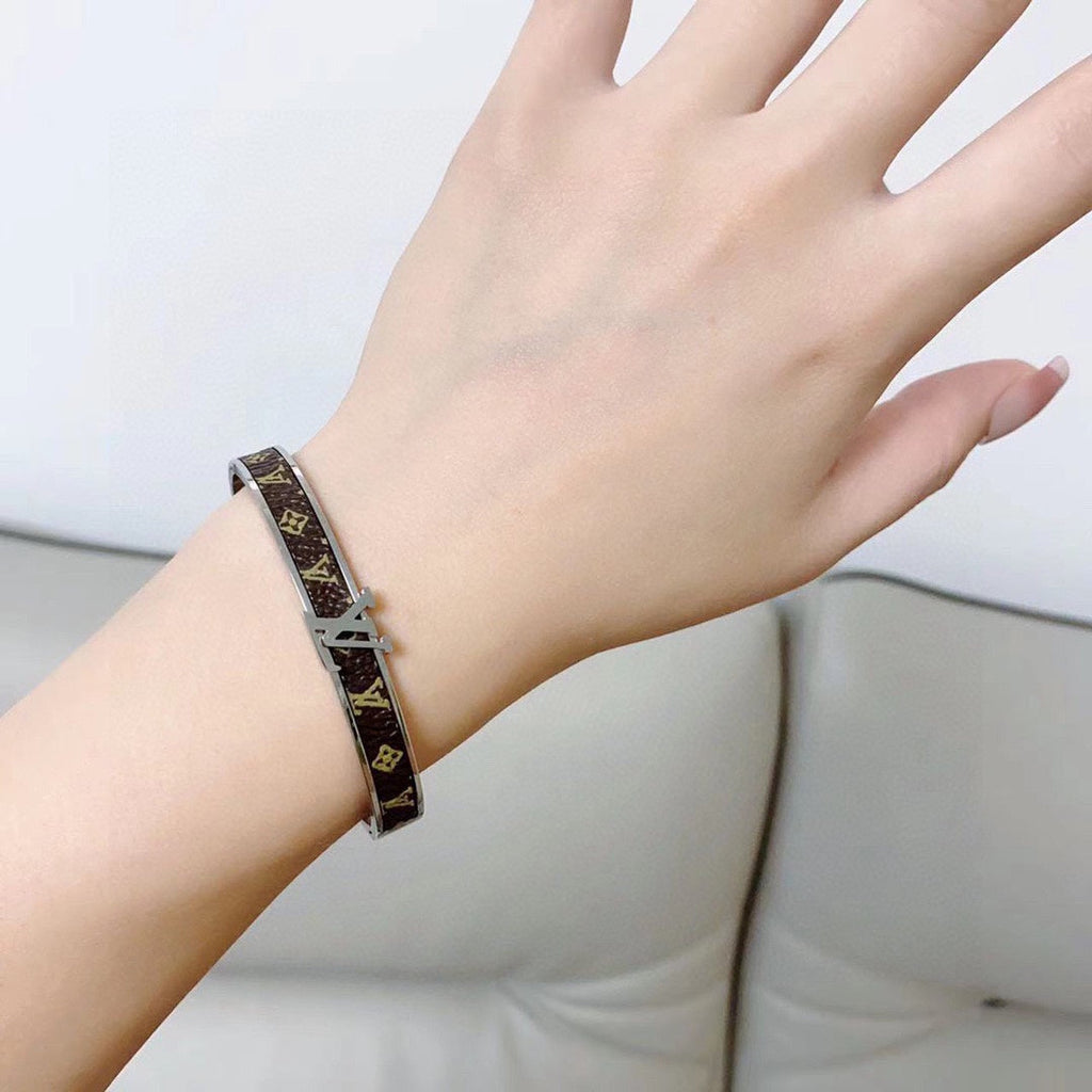 Louis Vuitton Leather Vintage 18K Gold Bracelet