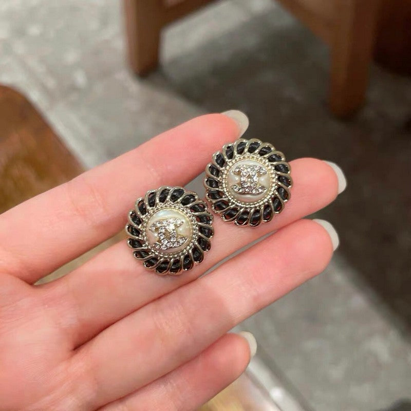 Chanel Black 18K Gold Earrings