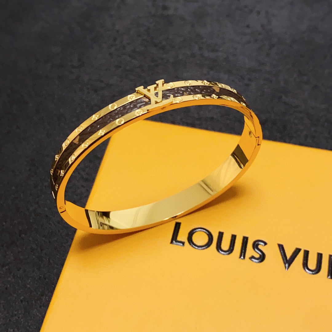 Louis Vuitton Leather Vintage 18K Gold Bracelet