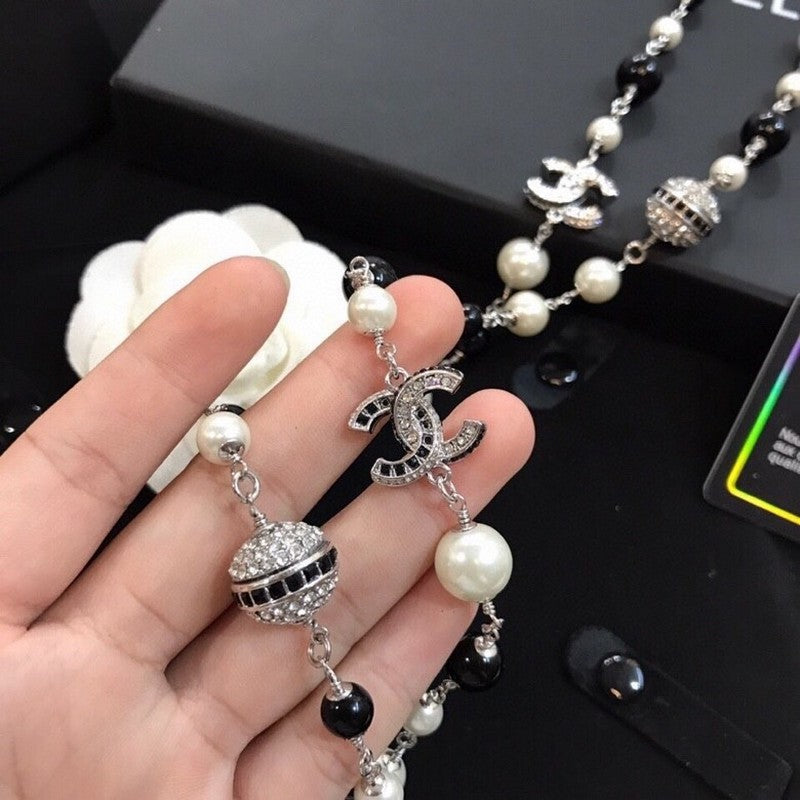 Chanel Long Black Pearl 18K Gold Necklace