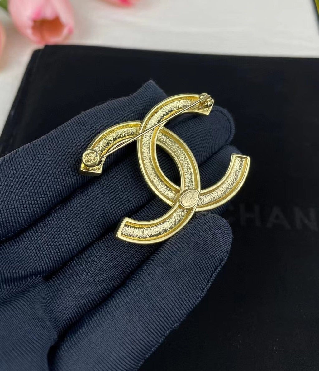Chanel 24S 18K Gold Brooch