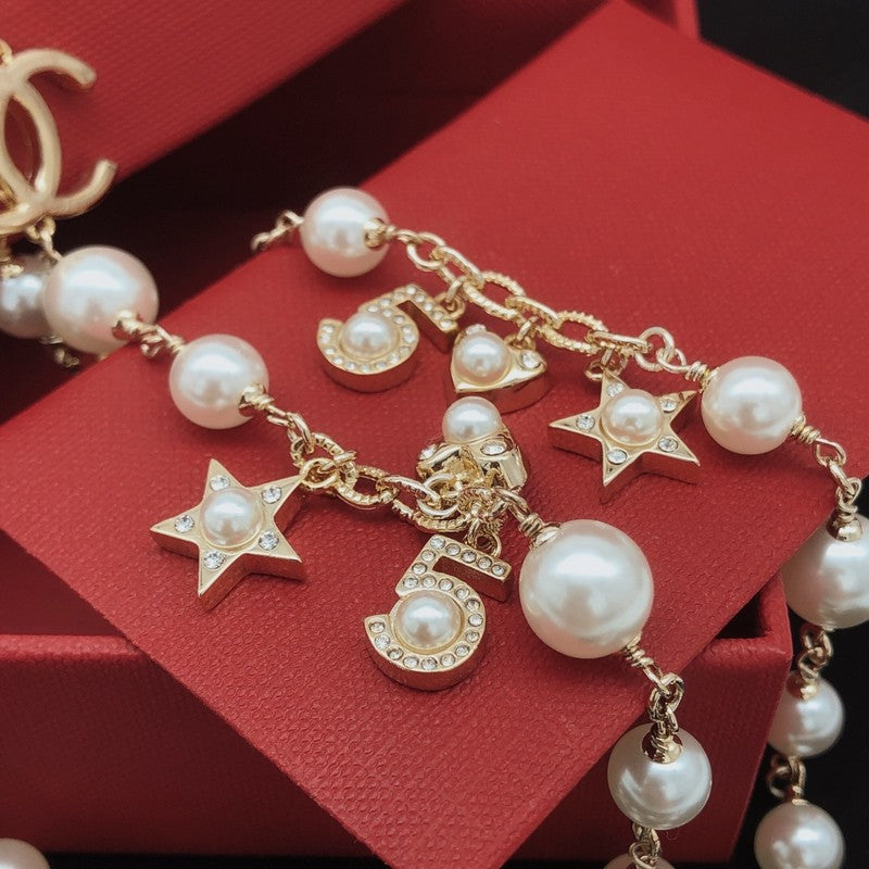 Chanel No.5 Star Long Pearl 18K Gold Necklace
