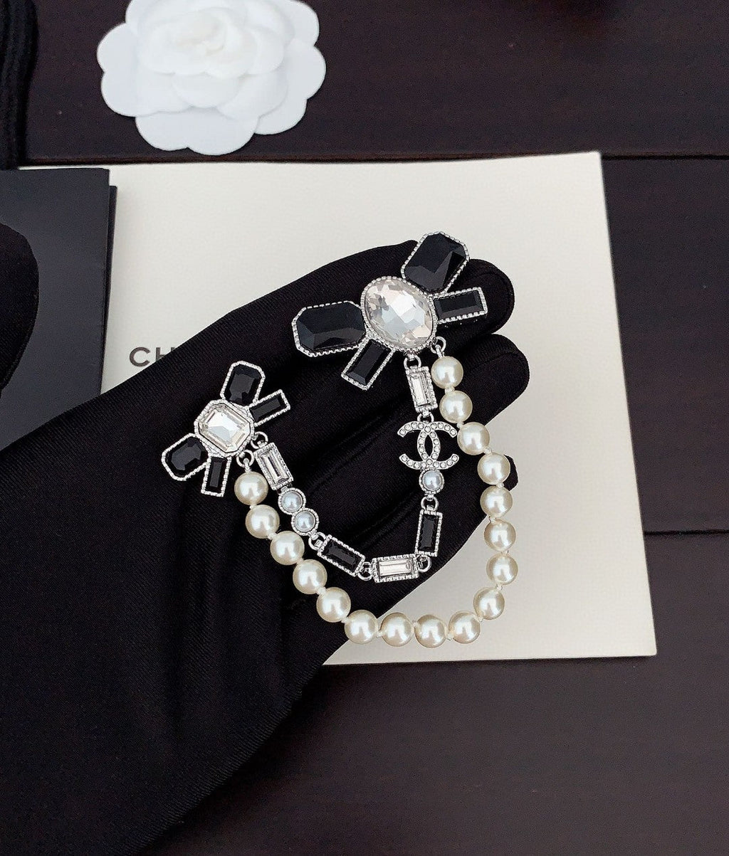 Chanel Black Bow Pearls 18K Gold Brooch