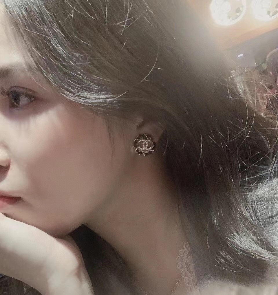 Chanel Black Leather 18K Gold Earrings