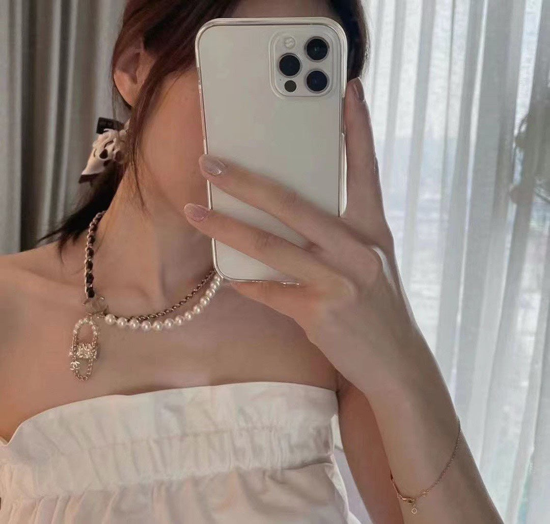 Chanel Pearl Bag Pendant 18K Gold Necklace