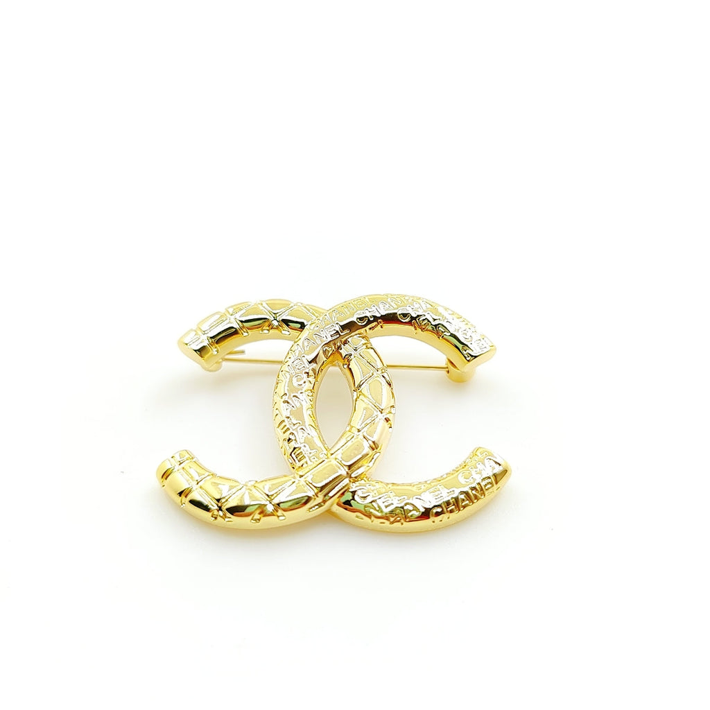 Chanel 24S 18K Gold Brooch