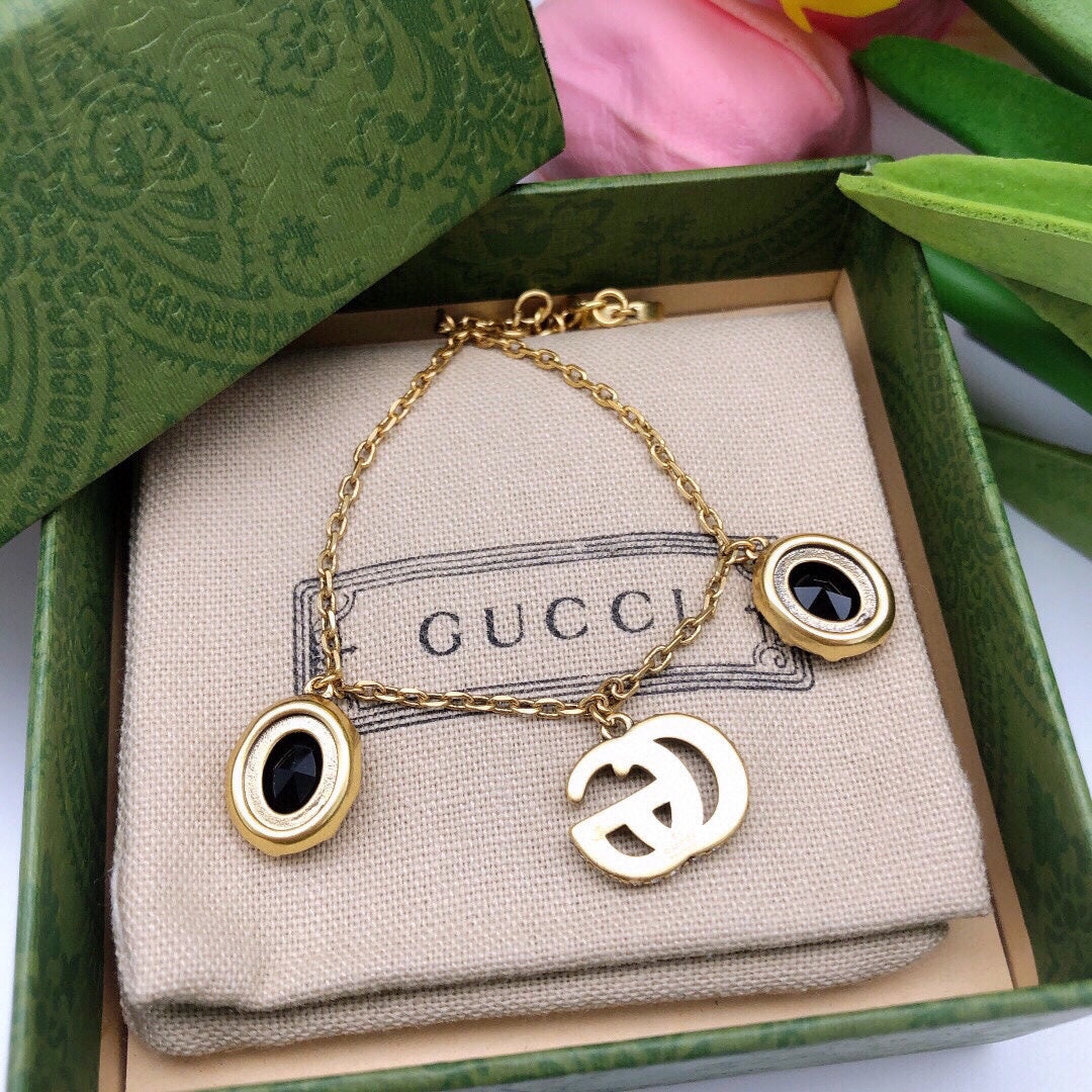 Gucci Double Black Stones 18K Gold Bracelet
