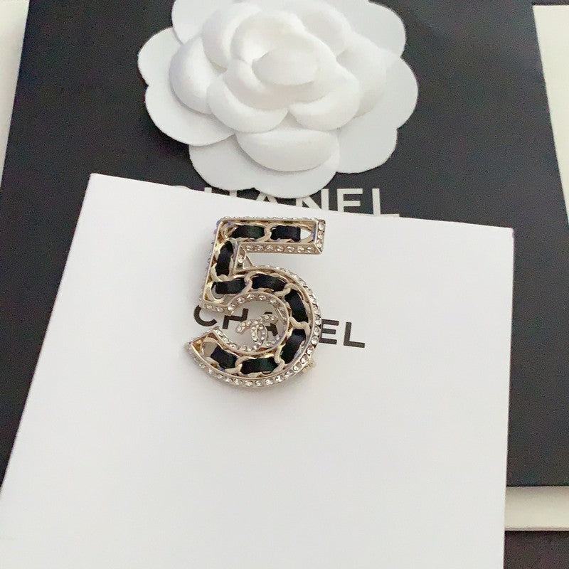 Chanel No.5 Leather Diamond 18K Gold Brooch