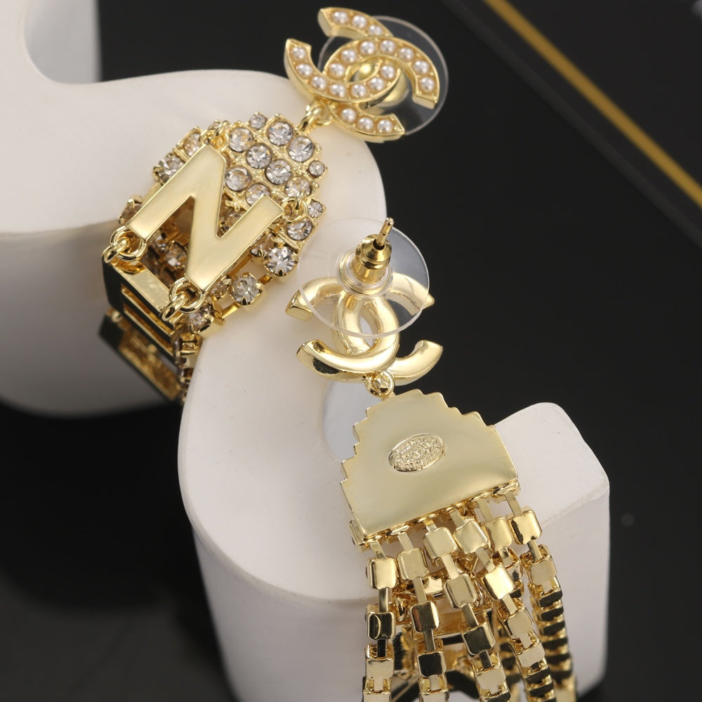 Chanel Letter 18K Gold Earrings